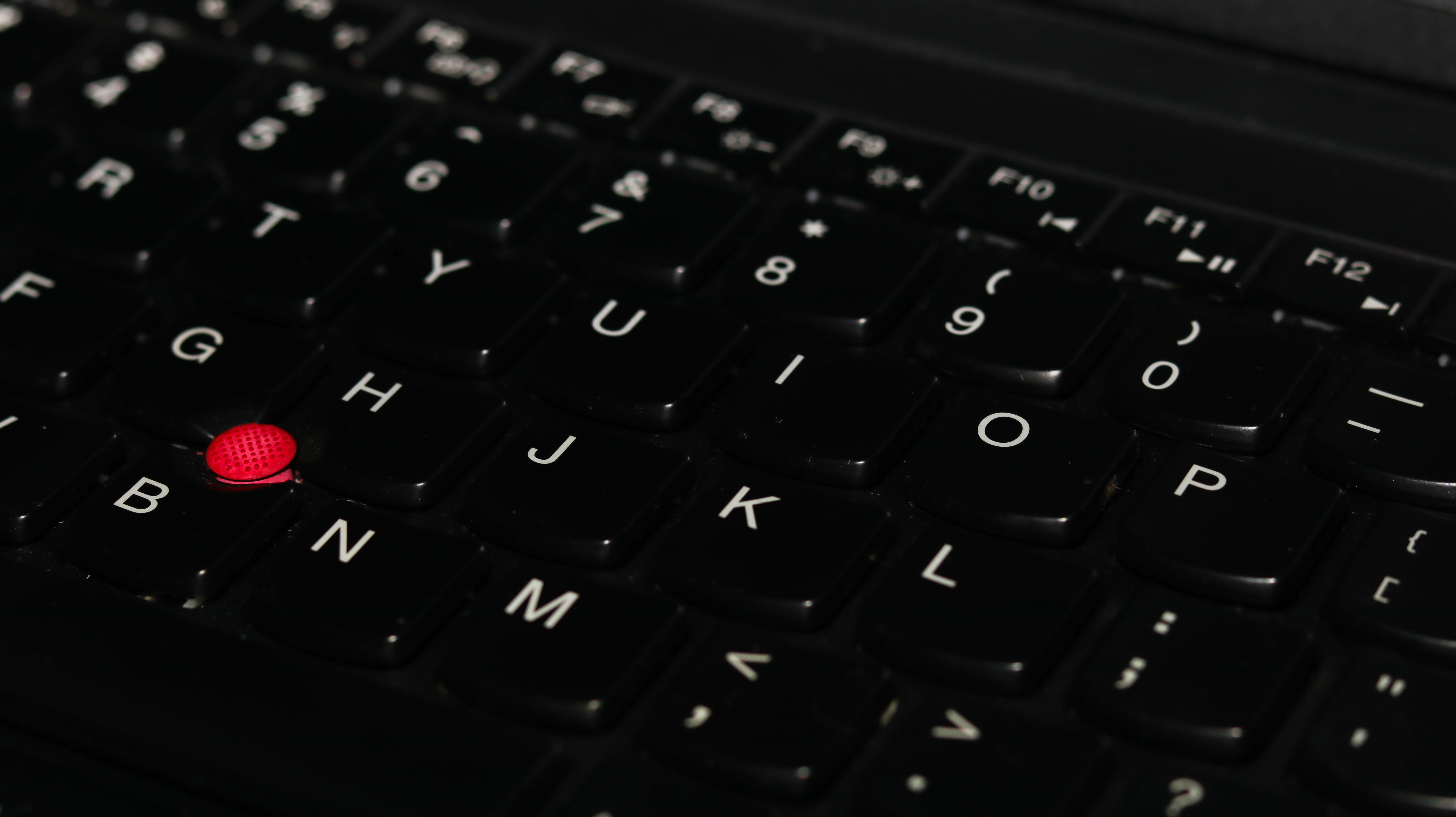 Photo,Of,Keyboard,With,Red,Trackpoint,Pointer,,Selective,Focus